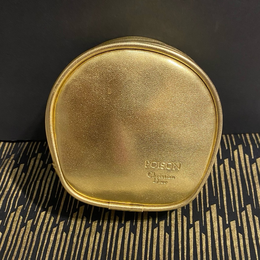 DIOR GOLD ZIPPER POUCH